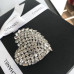 ysl-brooch